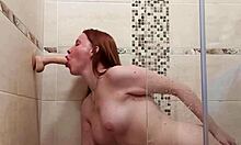 Nice young redheaded girl masturbates with a toy and cums in the bathroom